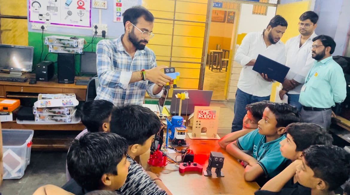 Students exploring robotics together during an EduCareersPath classroom session